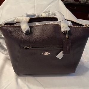Coach brown leather new crossbody bag with handles.